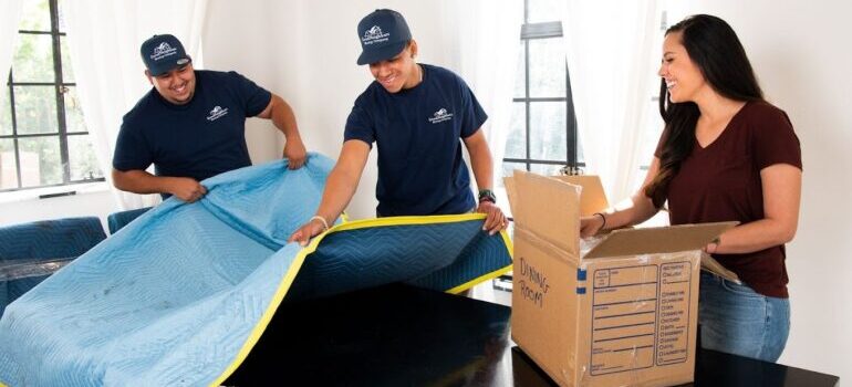 Two movers Los Angeles County has to offer helping a woman move.