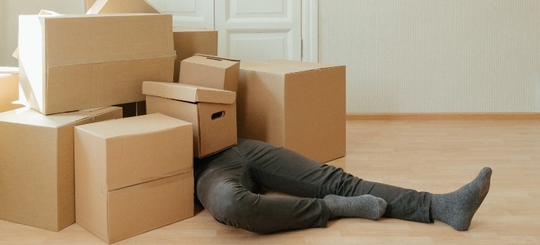 man stressed out about his relocation before hiring movers Alhambra CA residents trust