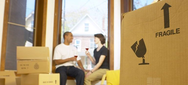 Couple celebrating a move - movers Studio City CA