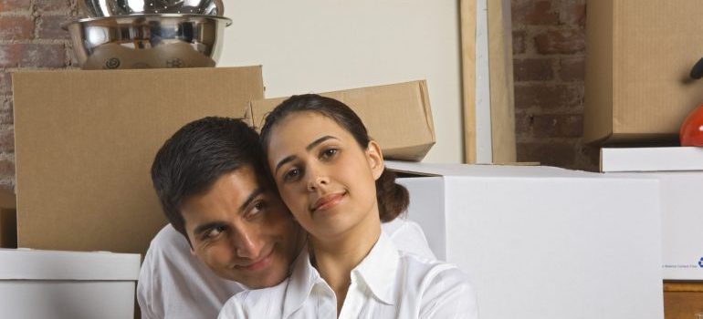 Couple with moving boxes