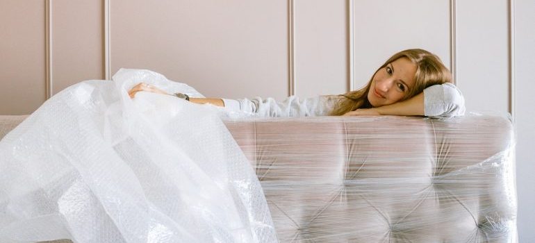 Woman similin while waiting for our movers San Marino CA